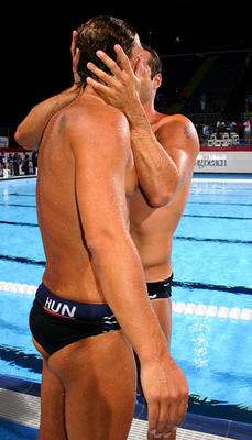 gay-swimmer-kissing-at-pool